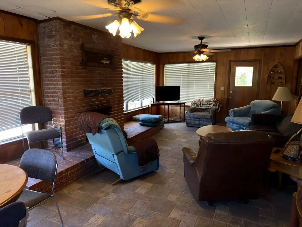 Living room with fireplace in the Brick House