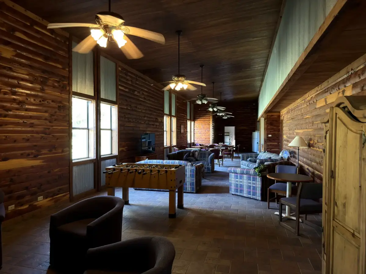 Large common living area with seating in the Bunk House at Sanctuary Ranch