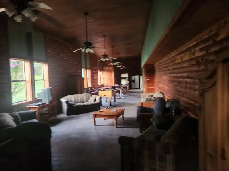 Spacious hunting lodge at The Sanctuary Ranch in Arkansas with bunk-style sleeping for up to 38 guests, ideal for group hunts and retreats